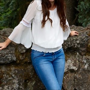 By & By Women’s White blouse with flare sleeves. Size small.